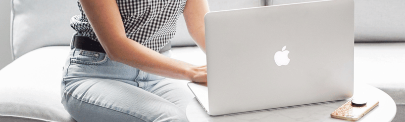 Woman working on Laptop in chic space